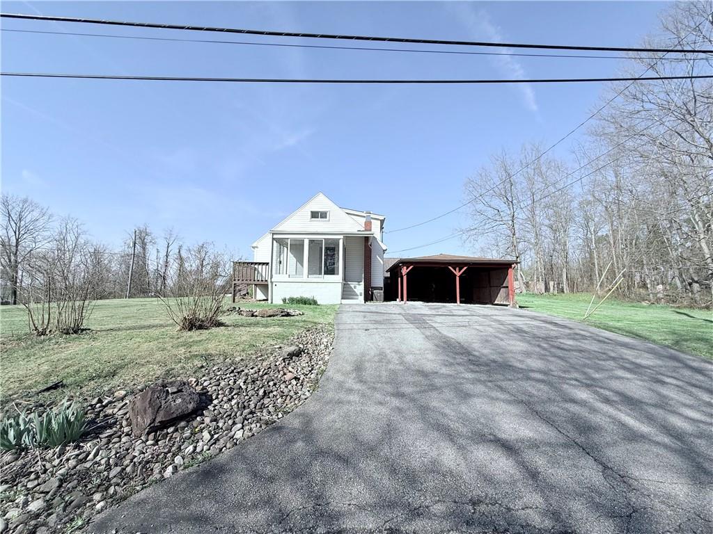 2724 Lookout Drive Elizabeth, PA 15037 - Photo 7 of 31 a front view of a house with a yard and garage