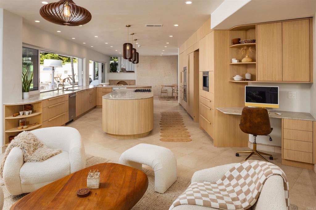 1904 Via Casa Alta La Jolla, CA 92037 - Photo 14 of 60 a living room with furniture and kitchen view