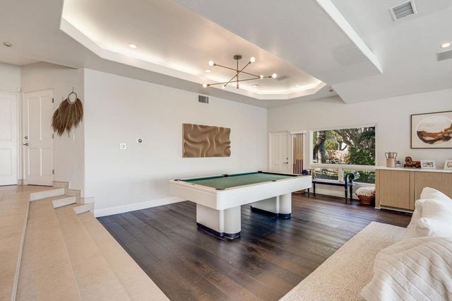 a bed room with furniture and a fireplace