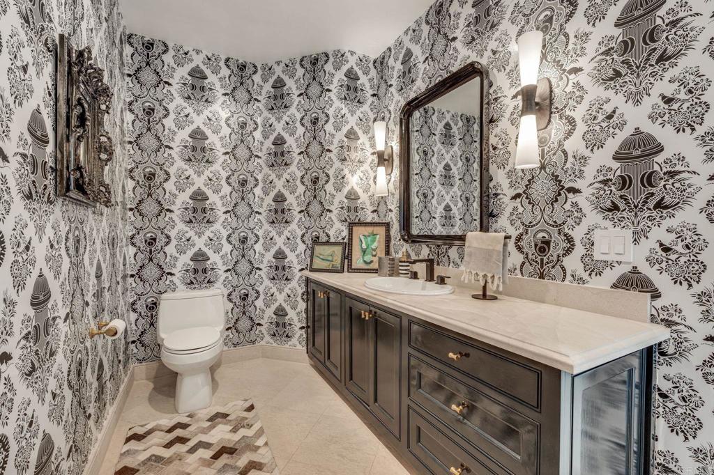 1904 Via Casa Alta La Jolla, CA 92037 - Photo 23 of 60 a bathroom with a sink and a toilet