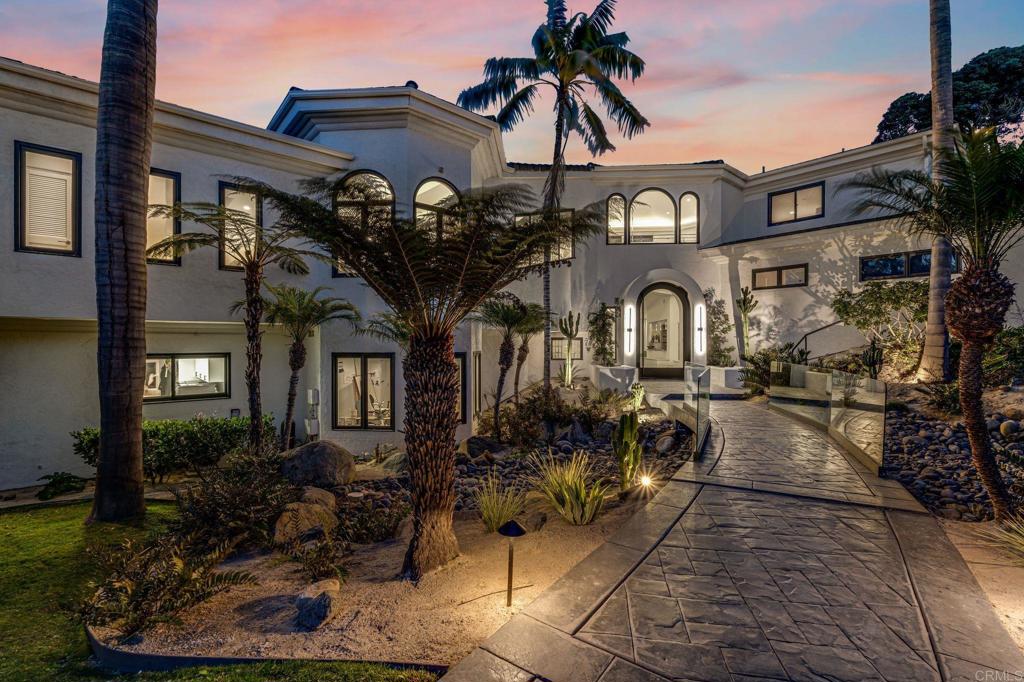 1904 Via Casa Alta La Jolla, CA 92037 - Photo 38 of 60 a front view of a house with a garden