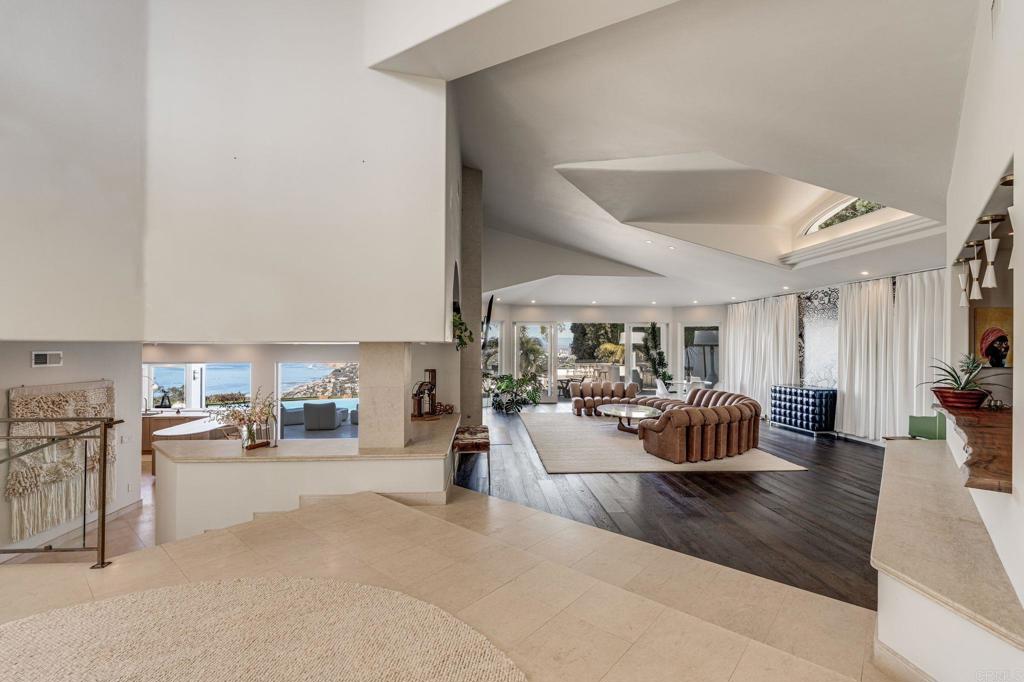 1904 Via Casa Alta La Jolla, CA 92037 - Photo 40 of 60 a living room with furniture and a large window