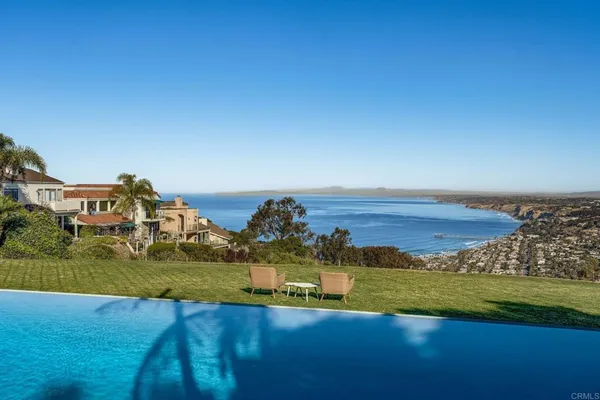 a view of a city with an ocean view