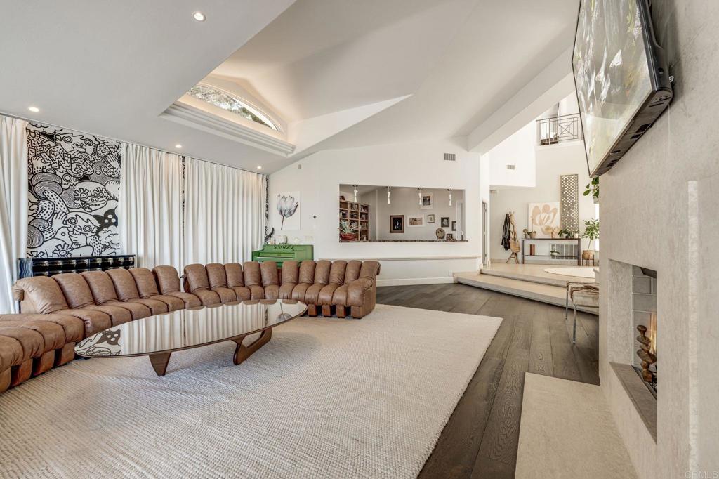 1904 Via Casa Alta La Jolla, CA 92037 - Photo 43 of 60 a living room with furniture and a wooden floor