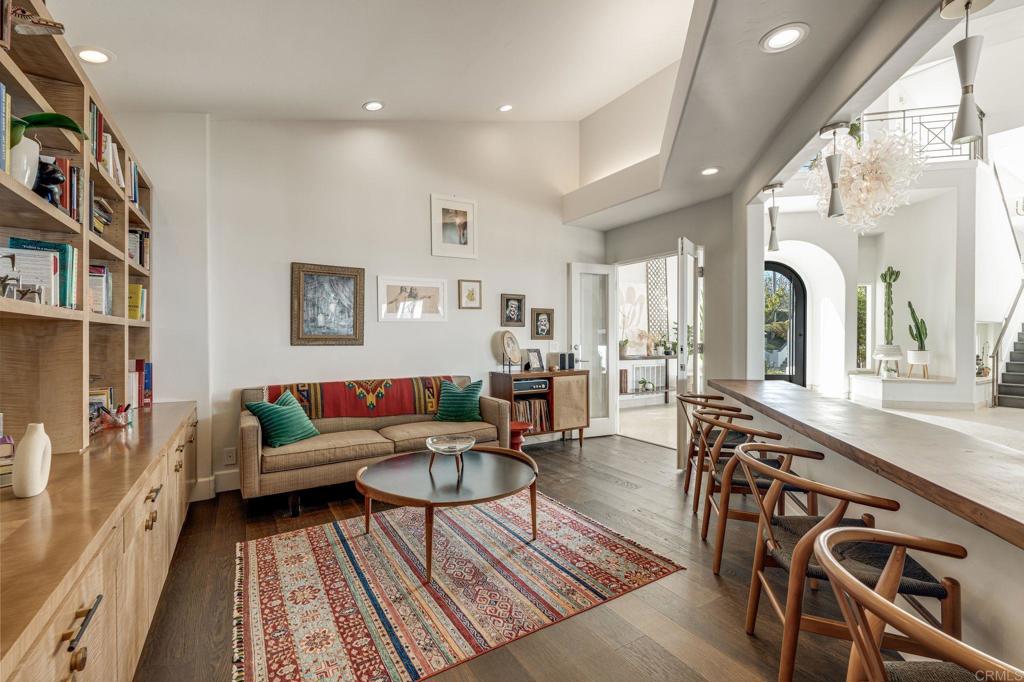 1904 Via Casa Alta La Jolla, CA 92037 - Photo 45 of 60 a living room with furniture and a wooden floor