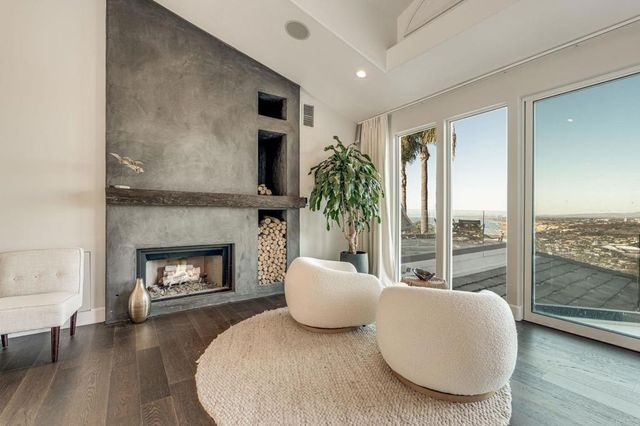 a spacious bedroom with a bed and a couch