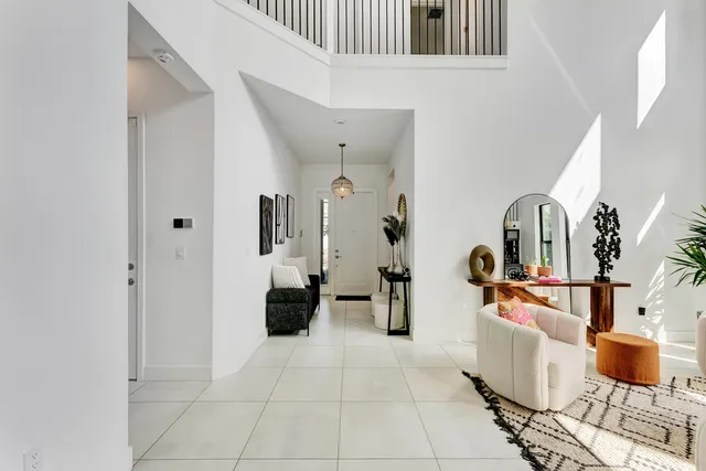 a view of living room with furniture and flat screen tv