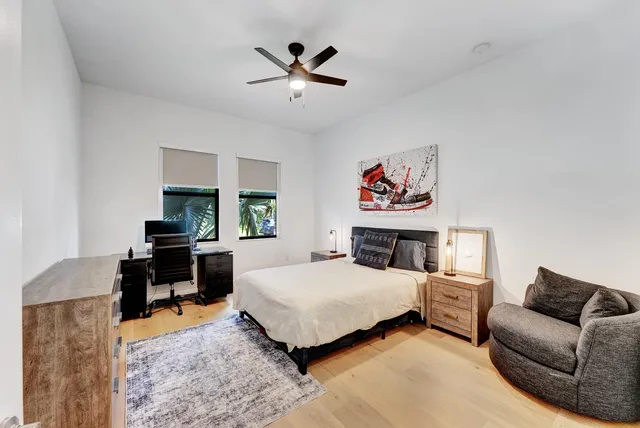 a bedroom with a bed and a couch