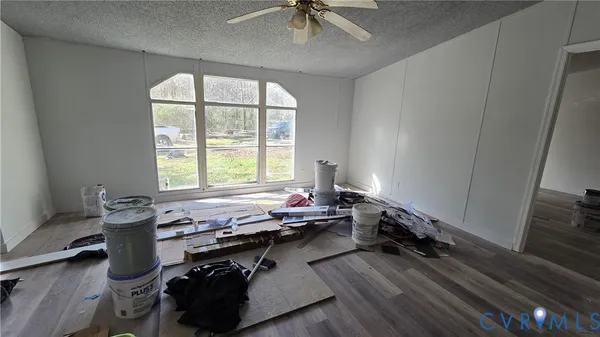 a room with window and a wooden floor