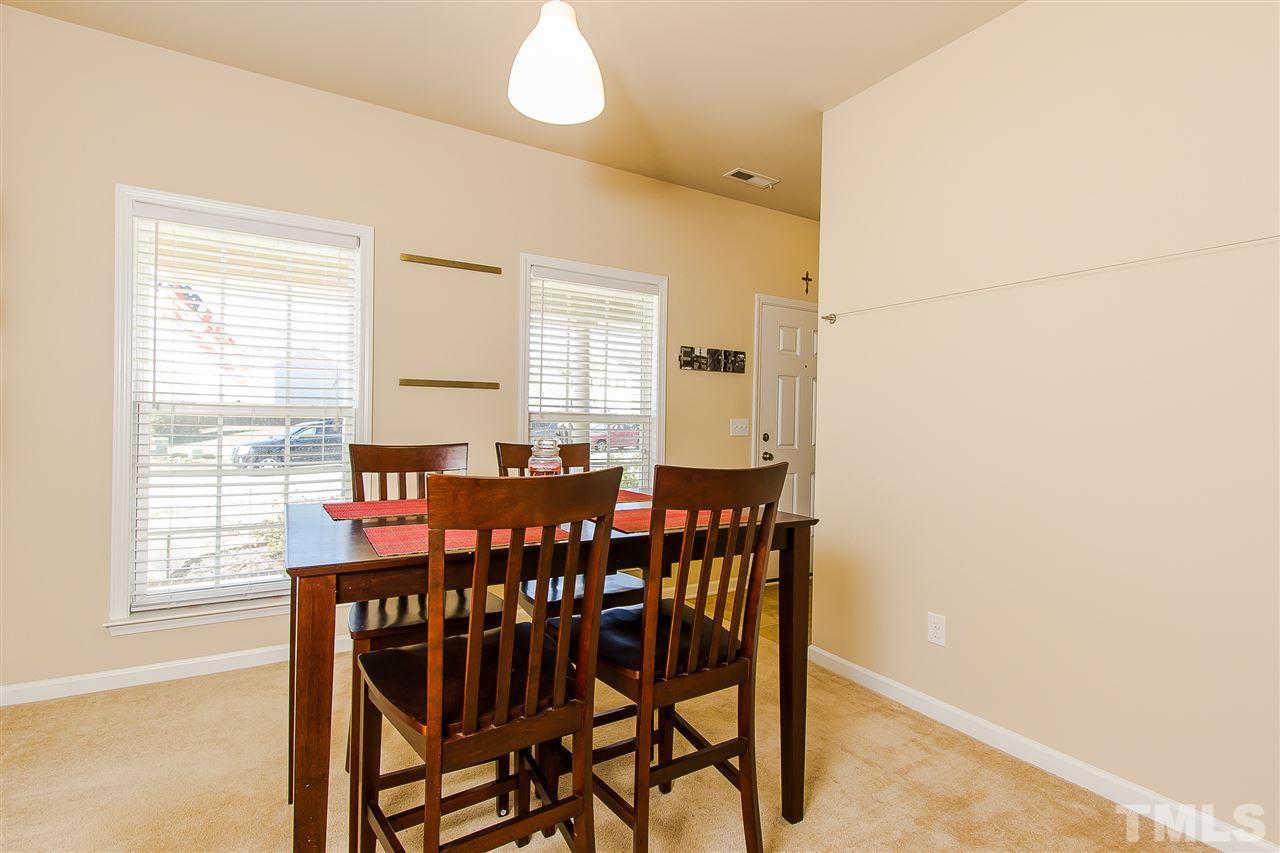 744 Stackhurst Way Wake Forest, NC 27587 - Photo 3 of 21 Ready to serve your guest a delicious meal? The dining room with large windows, neutral carpet, neutral color walls will make it easy to add your personal decorating ideas. This room has an easy access to the kitchen and pantry.