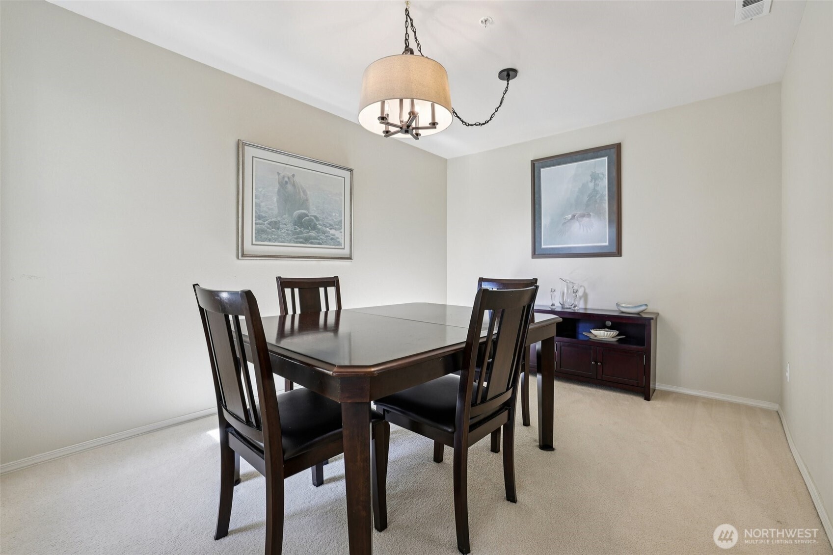 4109 224th Lane Southeast, Unit 207 Issaquah, WA 98029 - Photo 11 of 32 a view of a dining room with furniture