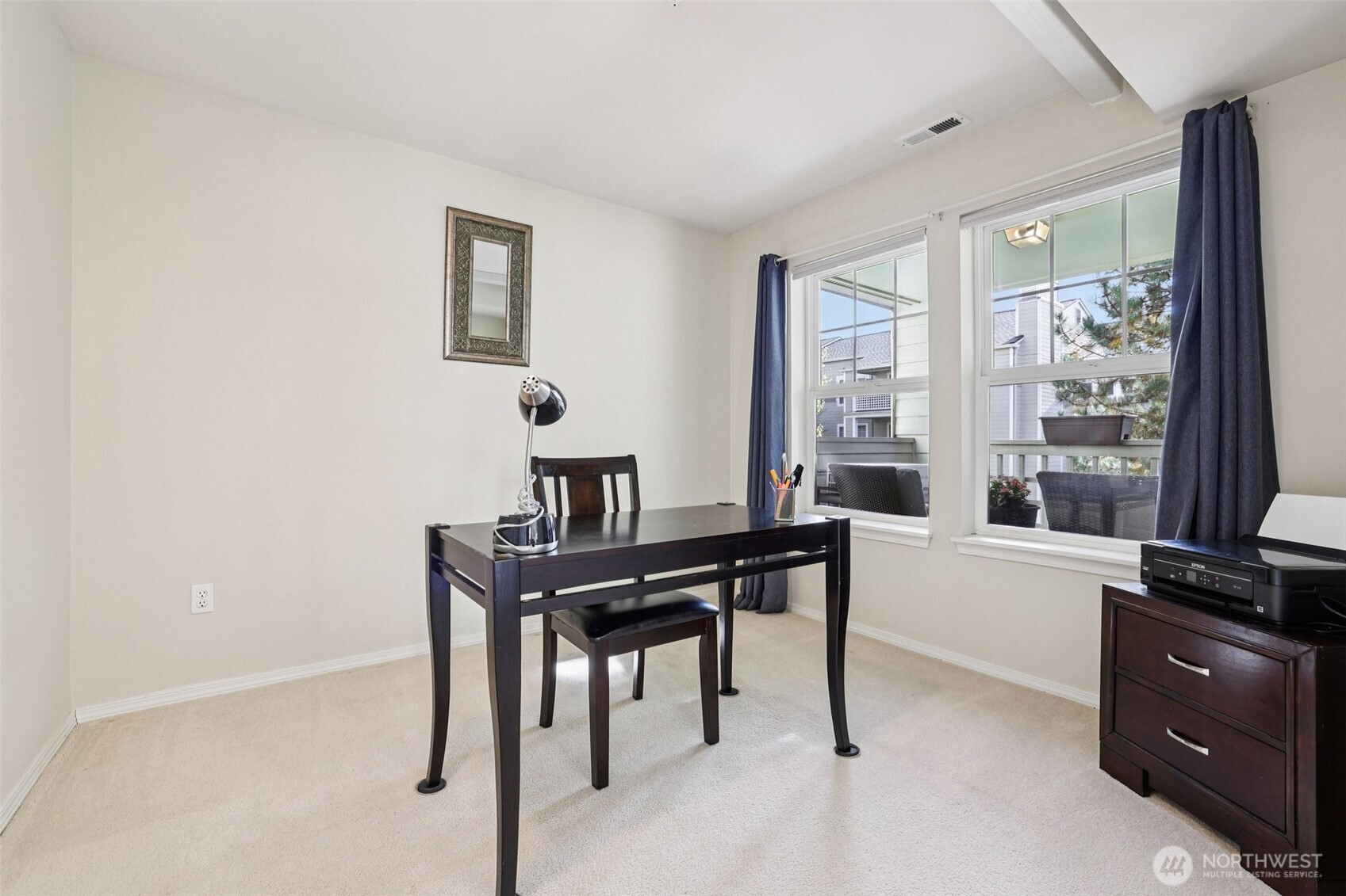 4109 224th Lane Southeast, Unit 207 Issaquah, WA 98029 - Photo 16 of 32 a view of a workspace with furniture and a window