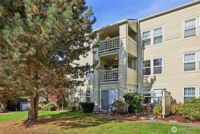 a front view of a building with street view