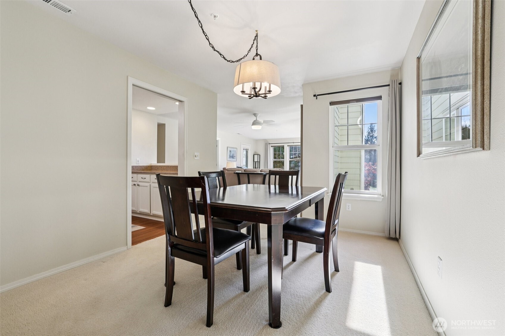 4109 224th Lane Southeast, Unit 207 Issaquah, WA 98029 - Photo 5 of 32 a view of a dining room with furniture