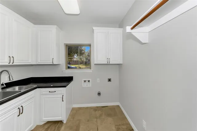 a view of a livingroom with a ceiling fan and window