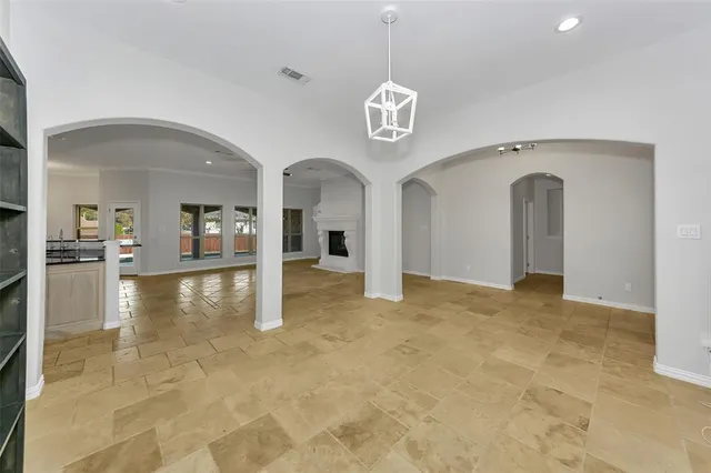 a kitchen with a stove and a sink