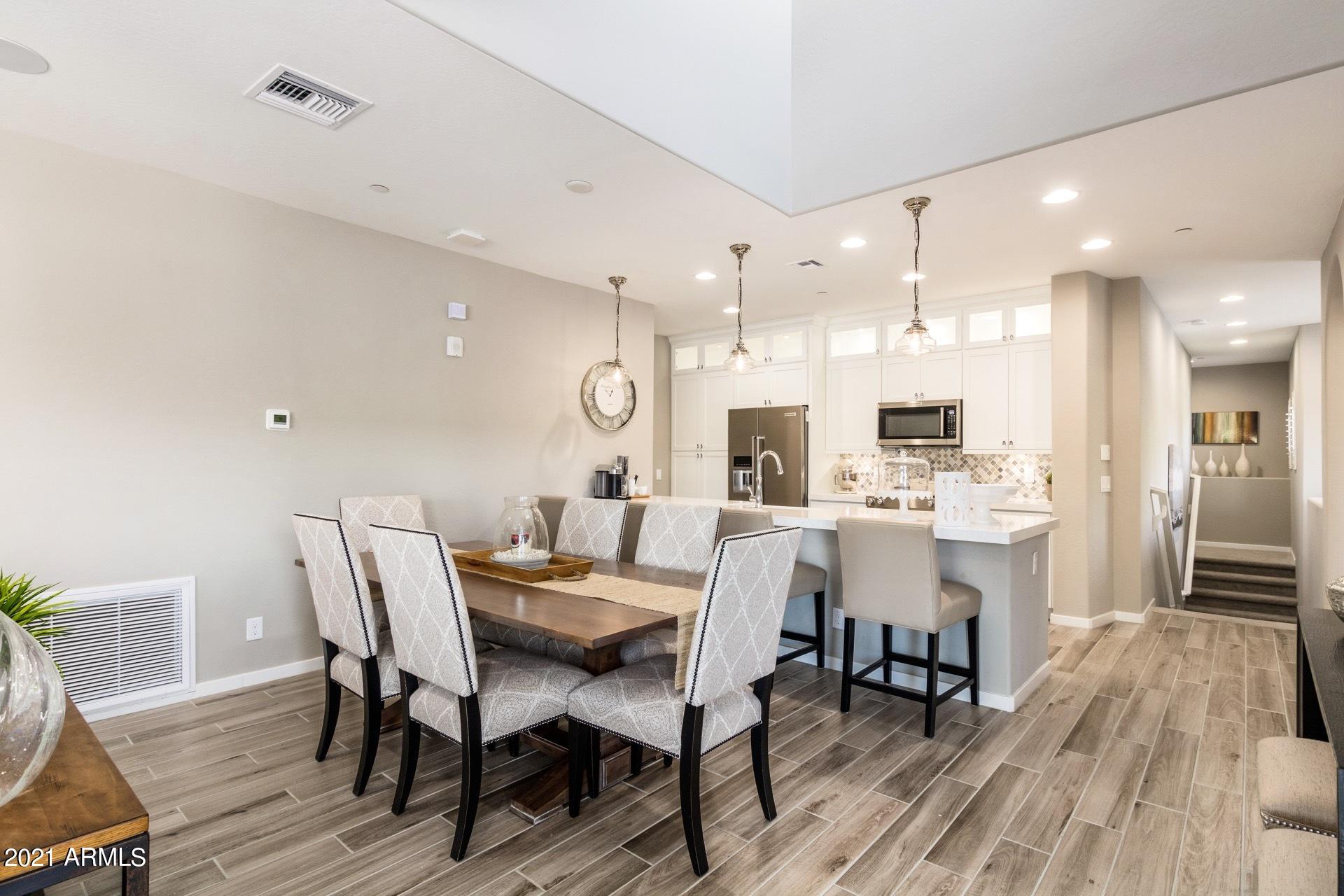 3935 East Rough Rider Road, Unit 1375 Phoenix, AZ 85050 - Photo 12 of 52 Spacious Dining Area