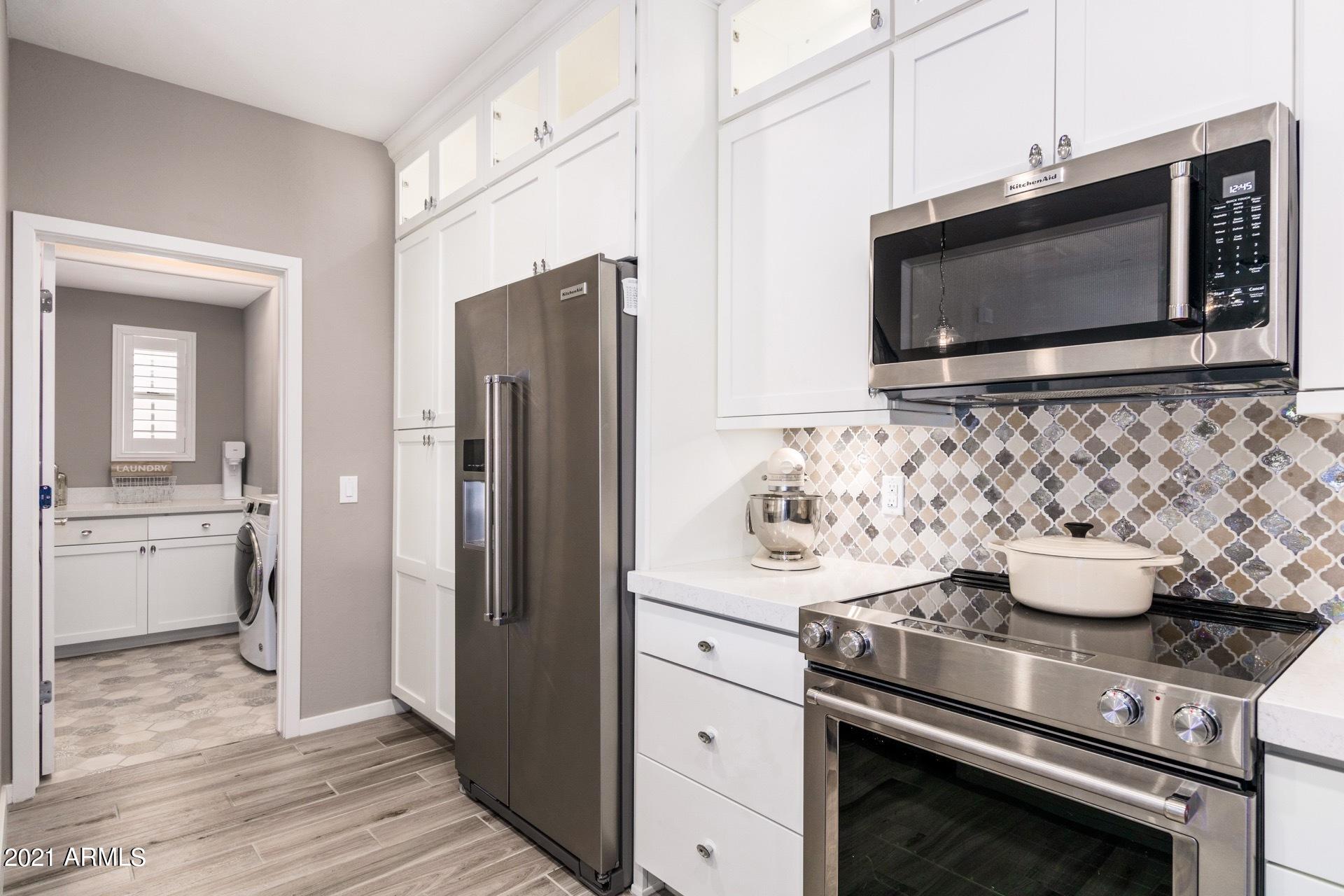 3935 East Rough Rider Road, Unit 1375 Phoenix, AZ 85050 - Photo 5 of 52 Kitchen Storage Galore