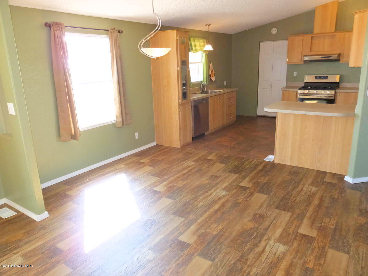 675 North Ambassador Road Dewey, AZ 86327 - Photo 6 of 32 Kitchen and Dining Area