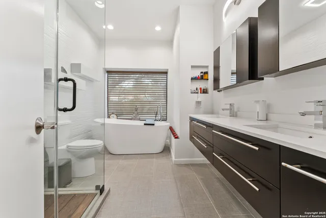 a living room with furniture gym equipment and a view of kitchen
