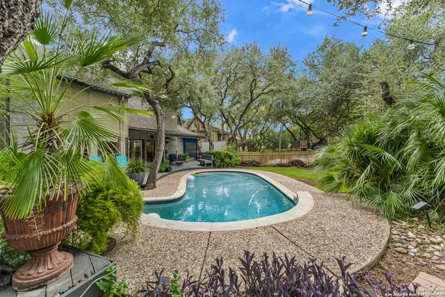 a view of a wooden deck with a bench