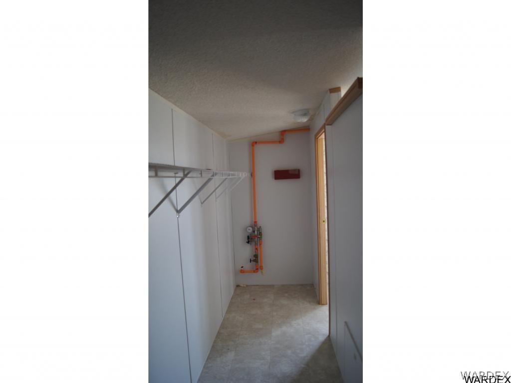 6955 South Windmill Ranch Road Kingman, AZ 86401 - Photo 16 of 33 Master Closed off of Bathroom