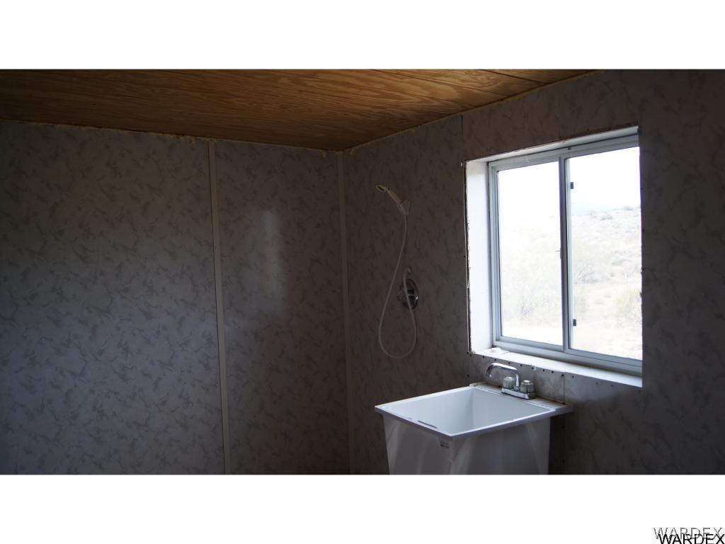 6955 South Windmill Ranch Road Kingman, AZ 86401 - Photo 19 of 33 Handicap Bathroom off Laundry