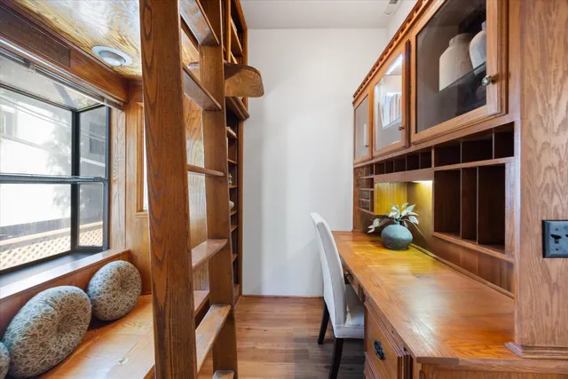 a kitchen with a stove oven and a window
