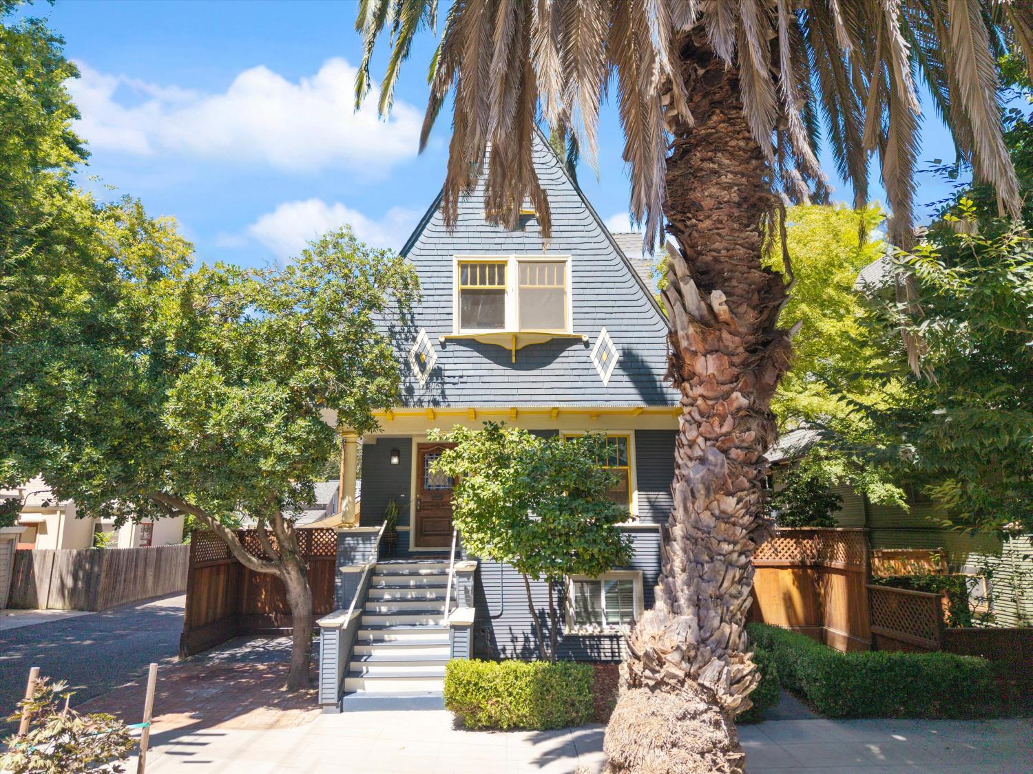 714 18th Street Sacramento, CA 95811 - Photo 2 of 43 a front view of a house with a yard