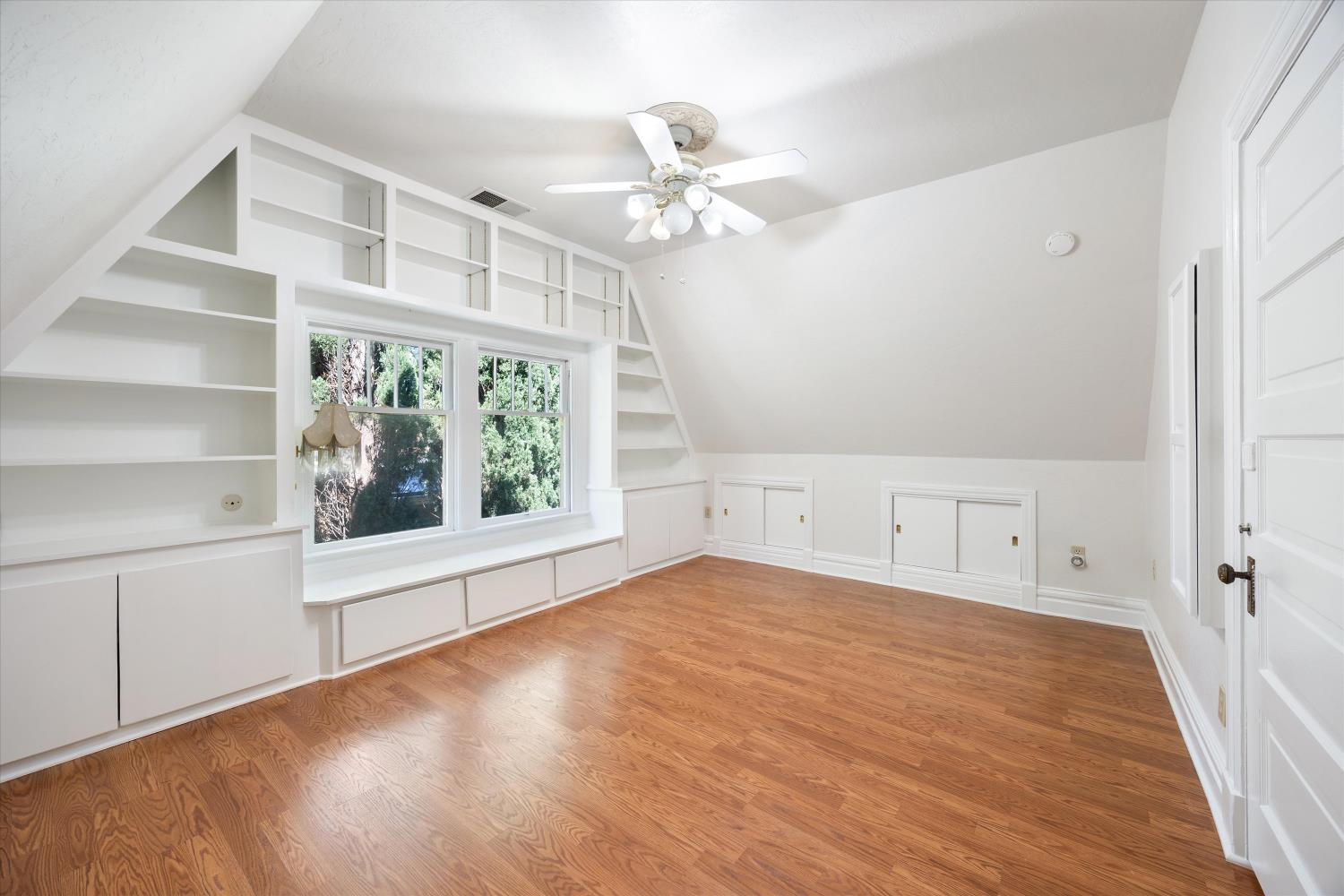 714 18th Street Sacramento, CA 95811 - Photo 26 of 43 wooden floor in an empty room with a window