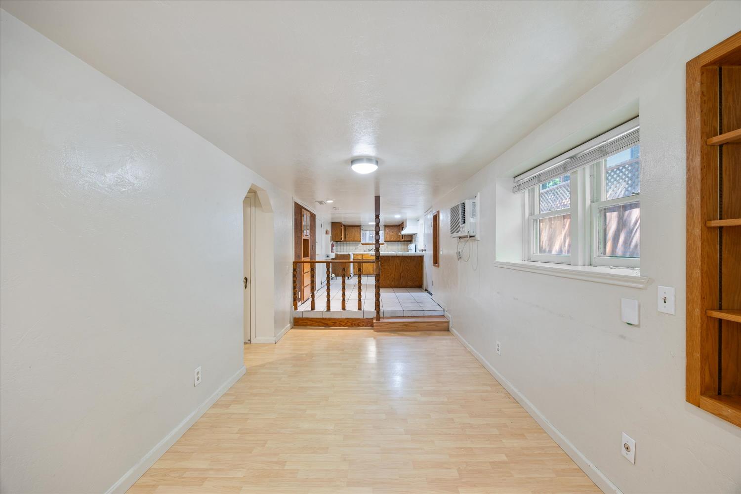 714 18th Street Sacramento, CA 95811 - Photo 31 of 43 a view of a hallway with furniture and floor to ceiling window
