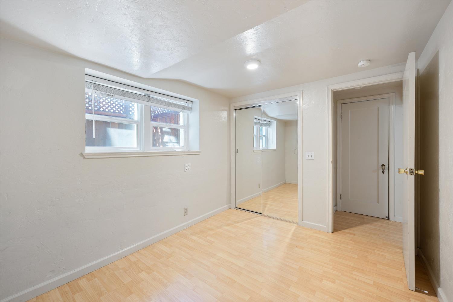 714 18th Street Sacramento, CA 95811 - Photo 34 of 43 an empty room with windows