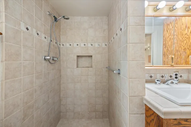 a view of a utility room with cabinets