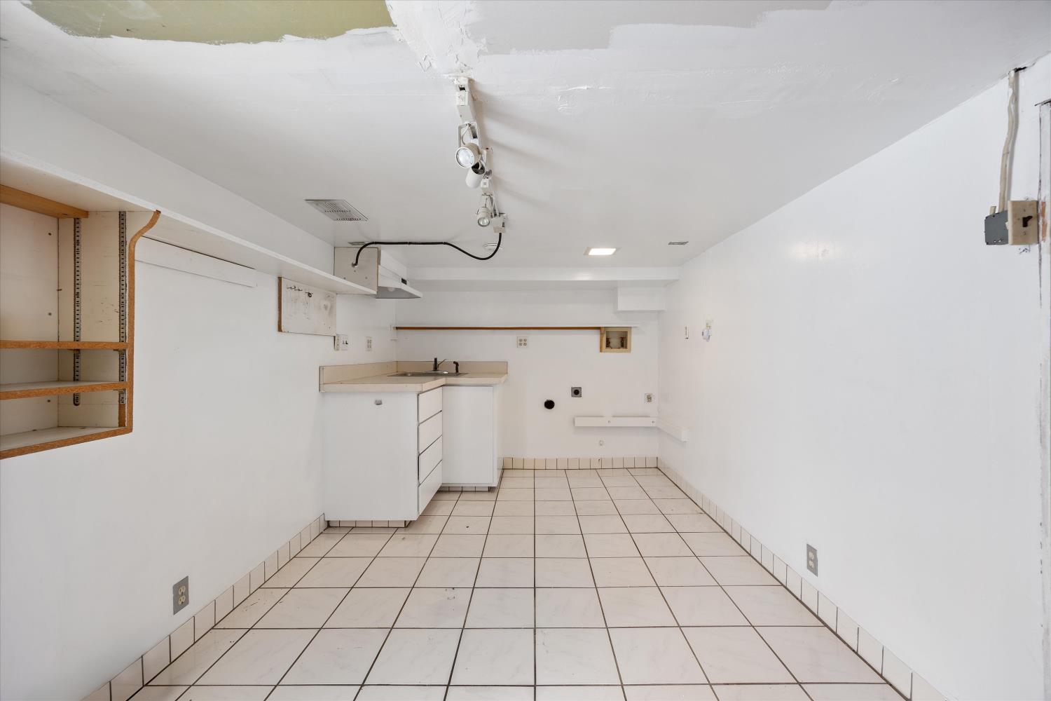 714 18th Street Sacramento, CA 95811 - Photo 37 of 43 a view of a utility room with cabinets