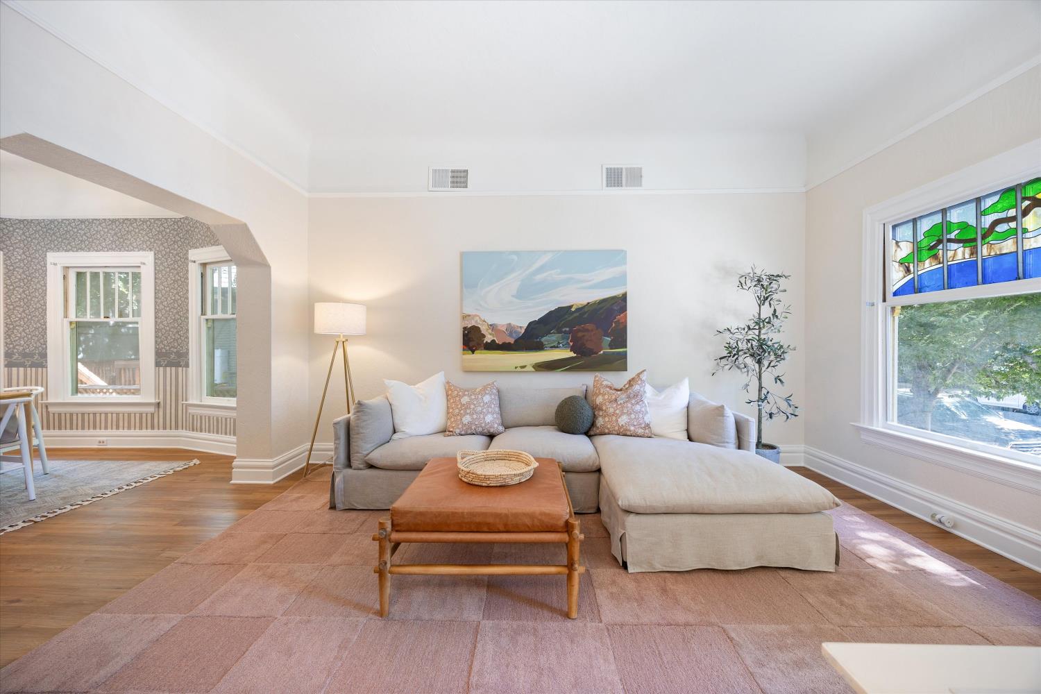 714 18th Street Sacramento, CA 95811 - Photo 7 of 43 a living room with furniture and a large window