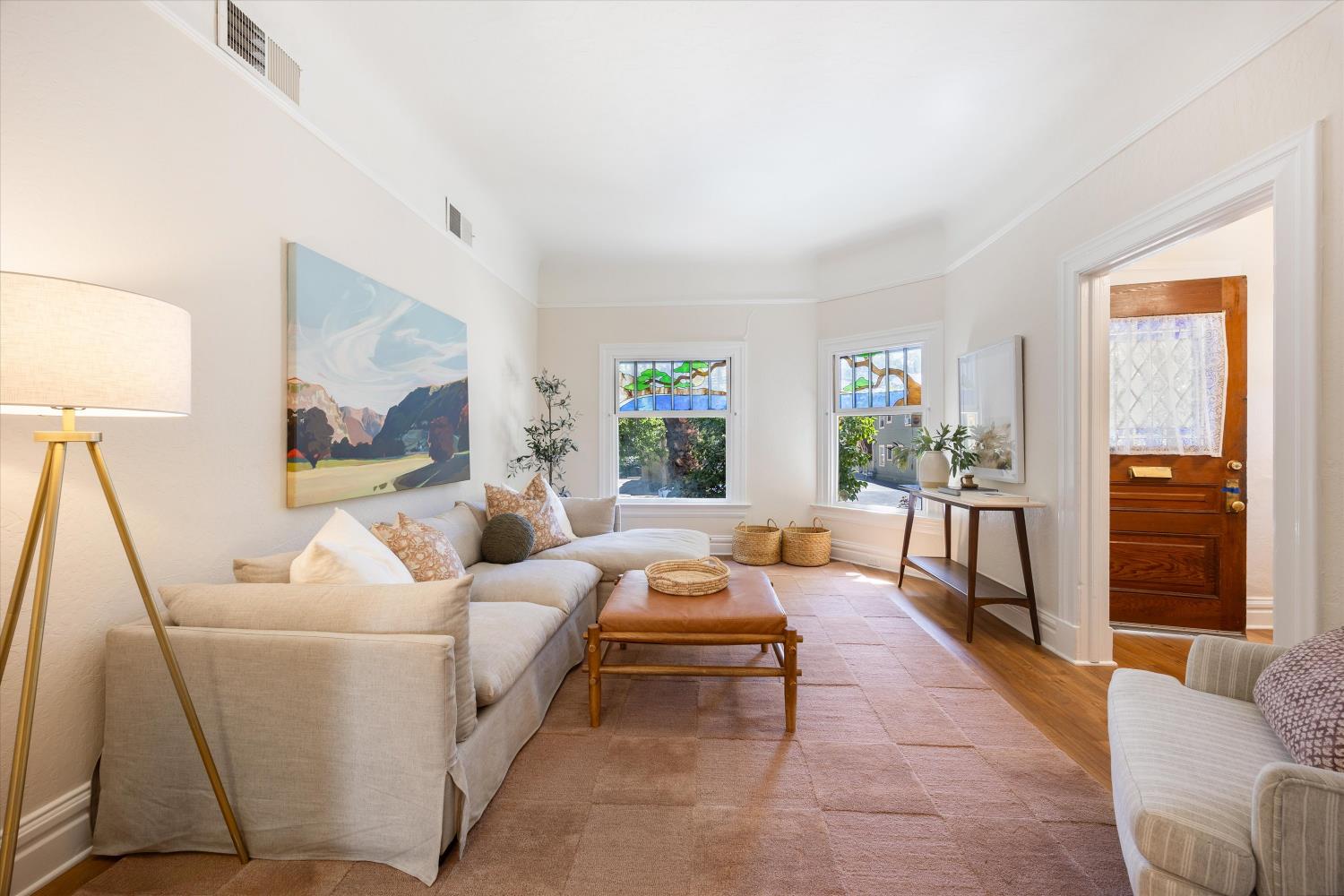 714 18th Street Sacramento, CA 95811 - Photo 8 of 43 a living room with furniture and a large window