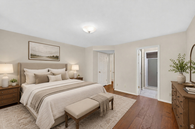 3120 North Apache Way Provo, UT 84604 - Photo 6 of 58 Spacious bedroom featuring wood-finish flooring, light-toned wall finishes, and a flush-mount ceiling fixture