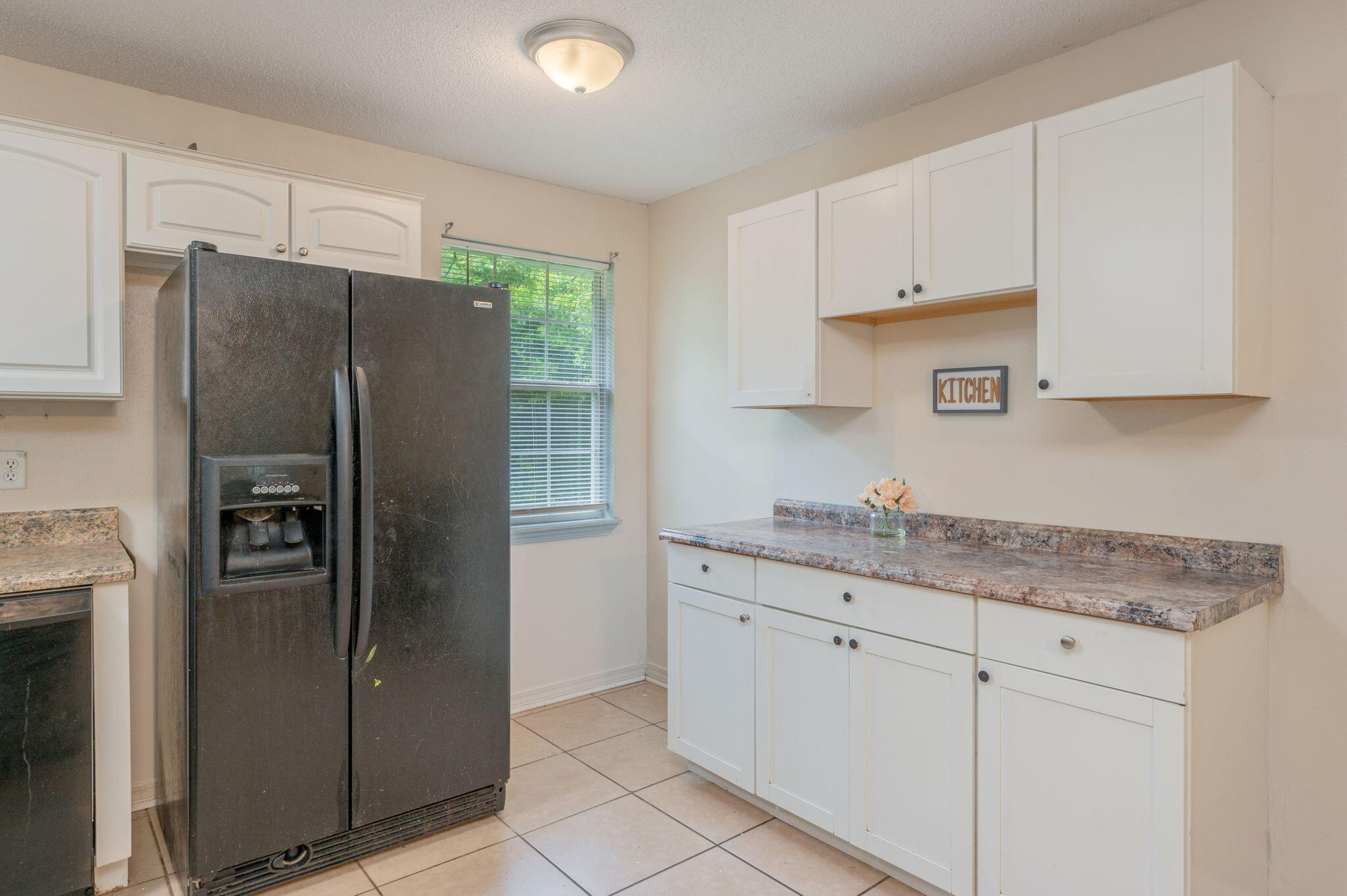 834 McDonald Street Crestview, FL 32536 - Photo 6 of 35 a kitchen with stainless steel appliances granite countertop a refrigerator and a sink