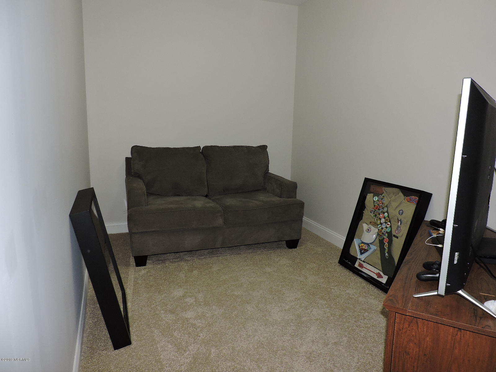 108 Holland Farm Road Cedar Point, NC 28584 - Photo 26 of 27 26 Upstairs den with storage area too