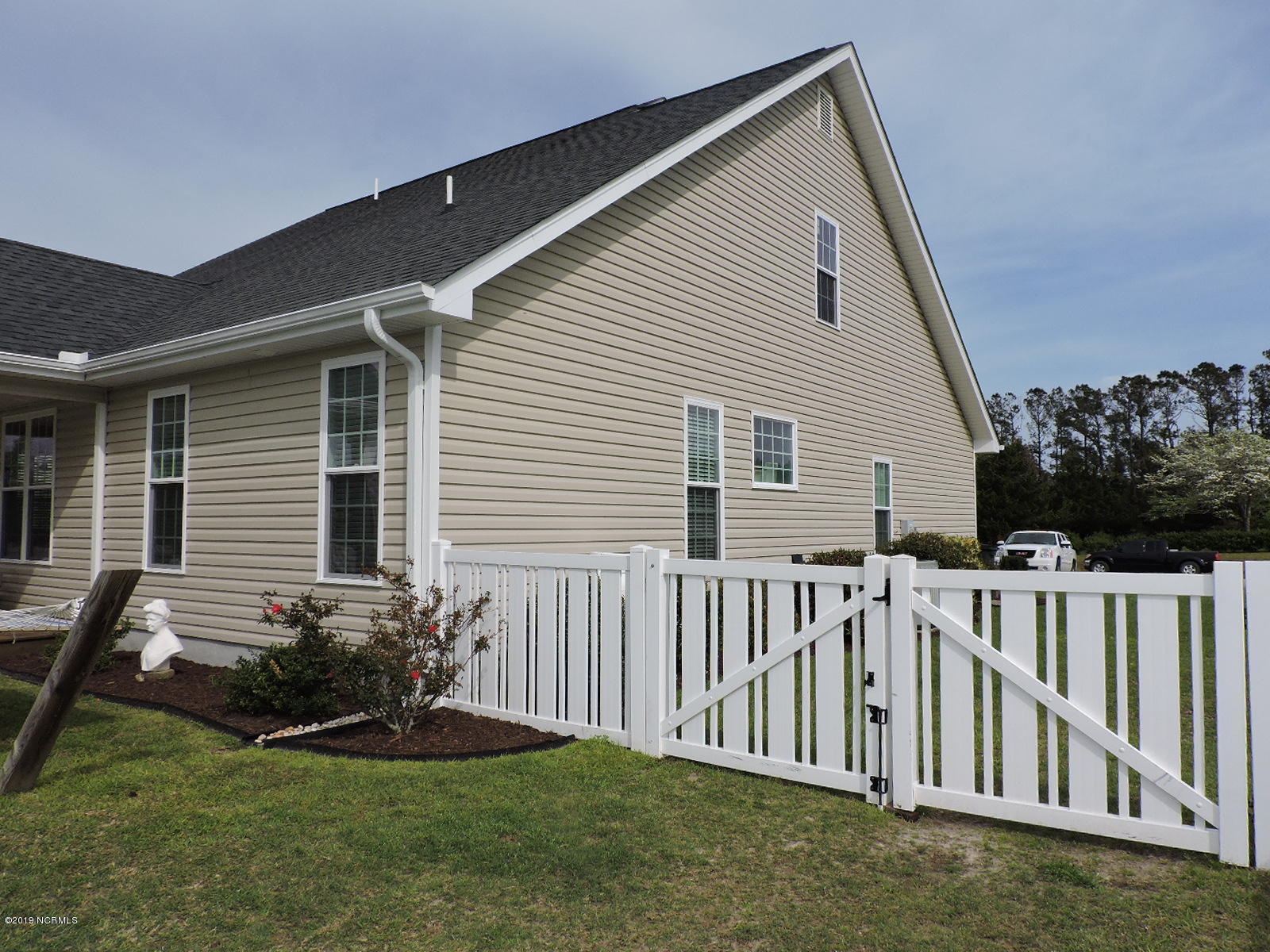 108 Holland Farm Road Cedar Point, NC 28584 - Photo 3 of 27 3 Side of home