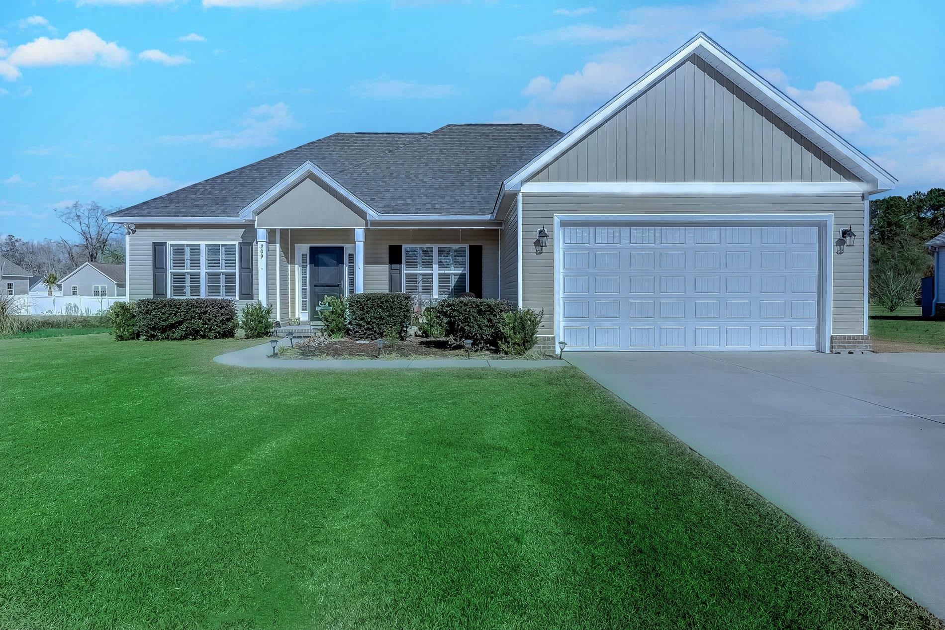 Ranch-style home featuring a front yard, a porch, concrete driveway, a garage, and roof with shingles
