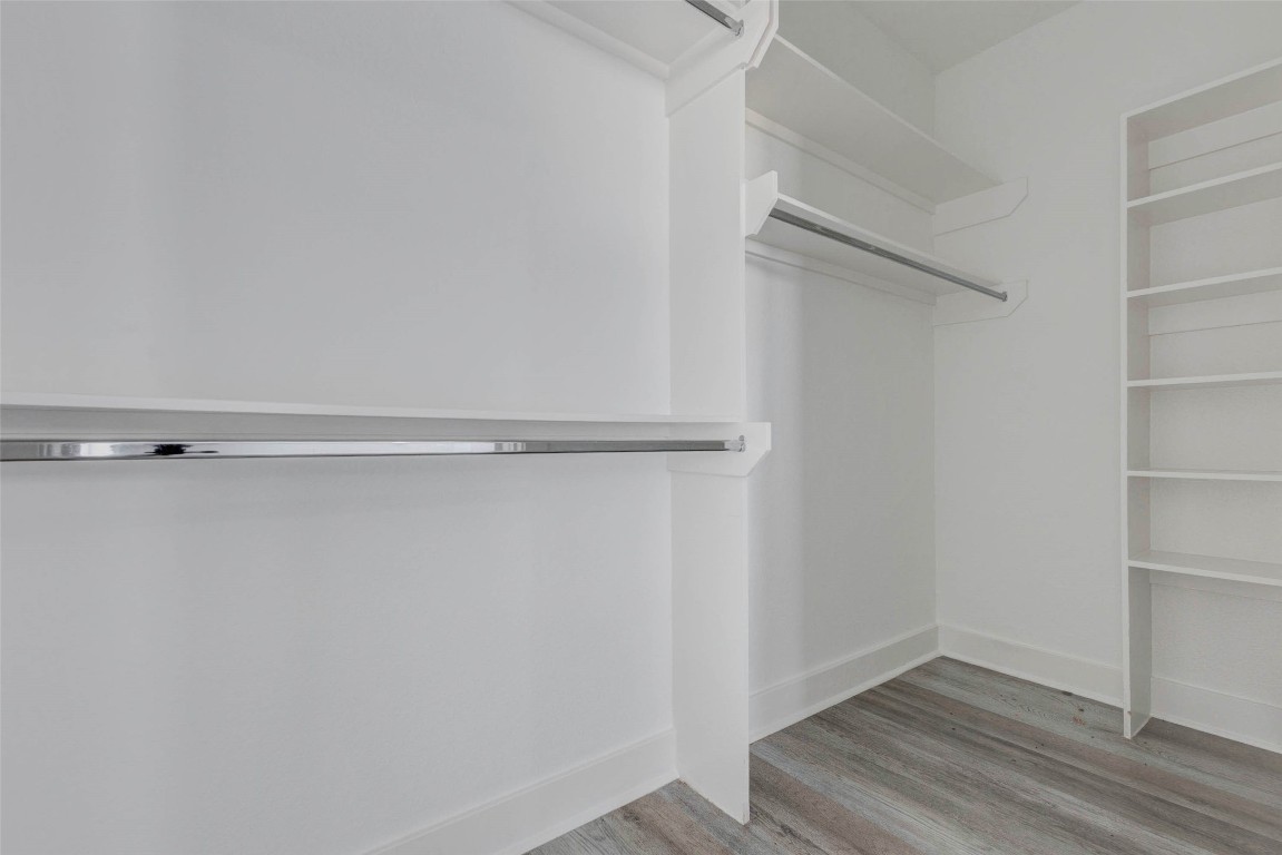 4834 Hollow Hook Road, Unit A Houston, TX 77041 - Photo 18 of 30 a view of an empty walk in closet