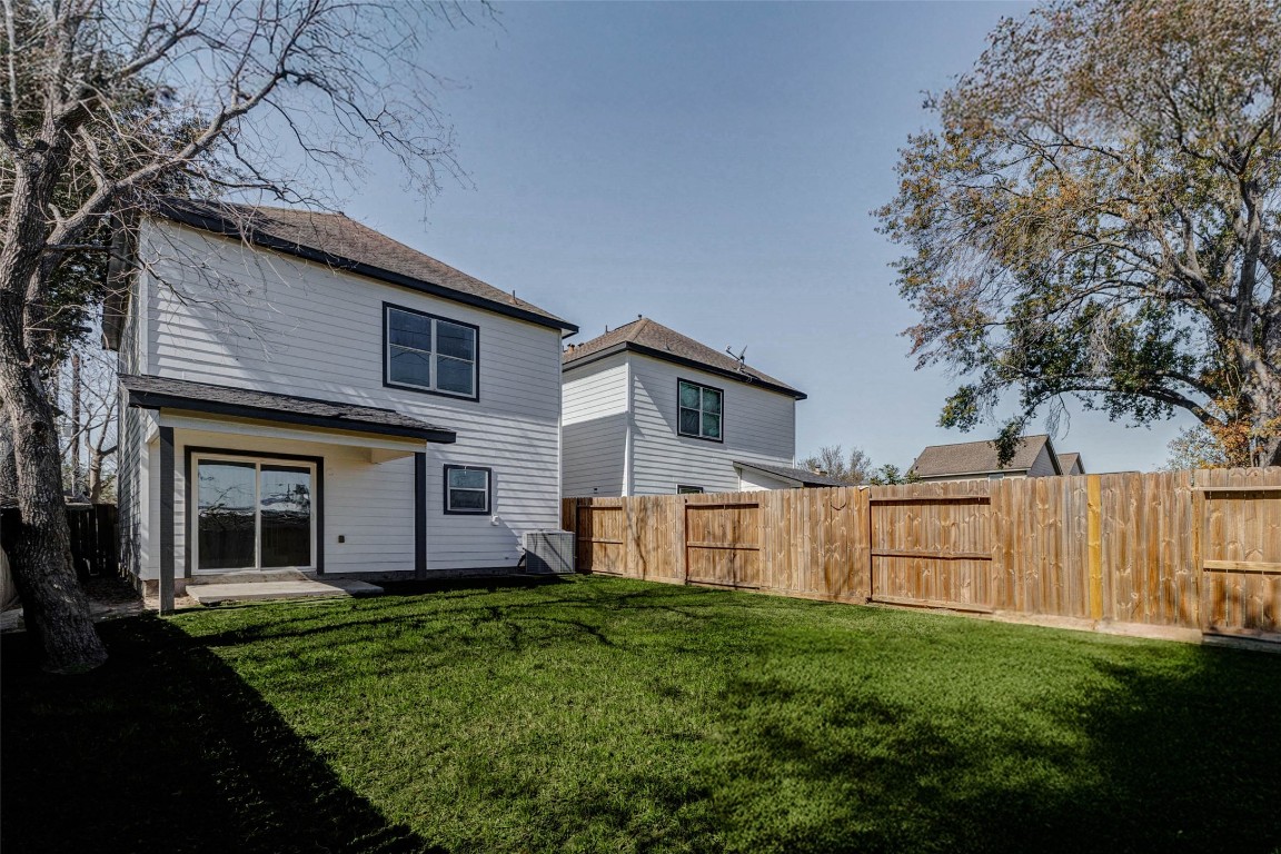 4834 Hollow Hook Road, Unit A Houston, TX 77041 - Photo 29 of 30 a view of a house with backyard and garden