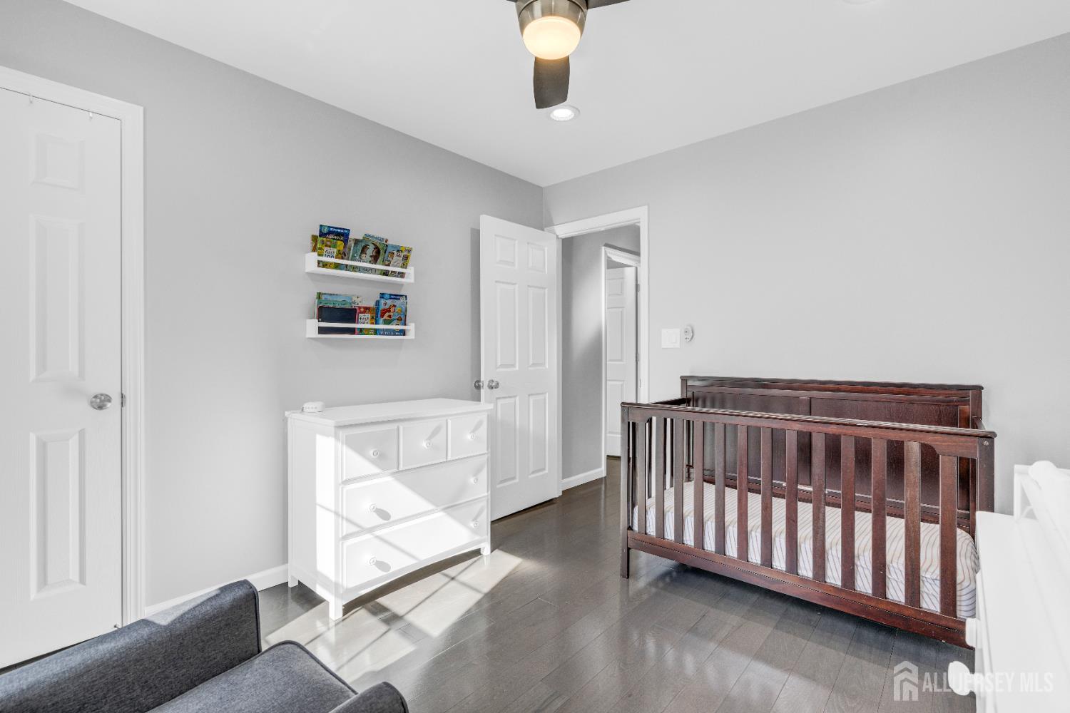 83 Pheasant Run Edison, NJ 08820 - Photo 27 of 38 a bedroom with furniture and a window