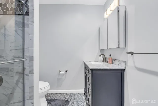 a view of a workspace with furniture