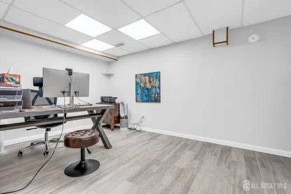 a room with stainless steel appliances and cabinets
