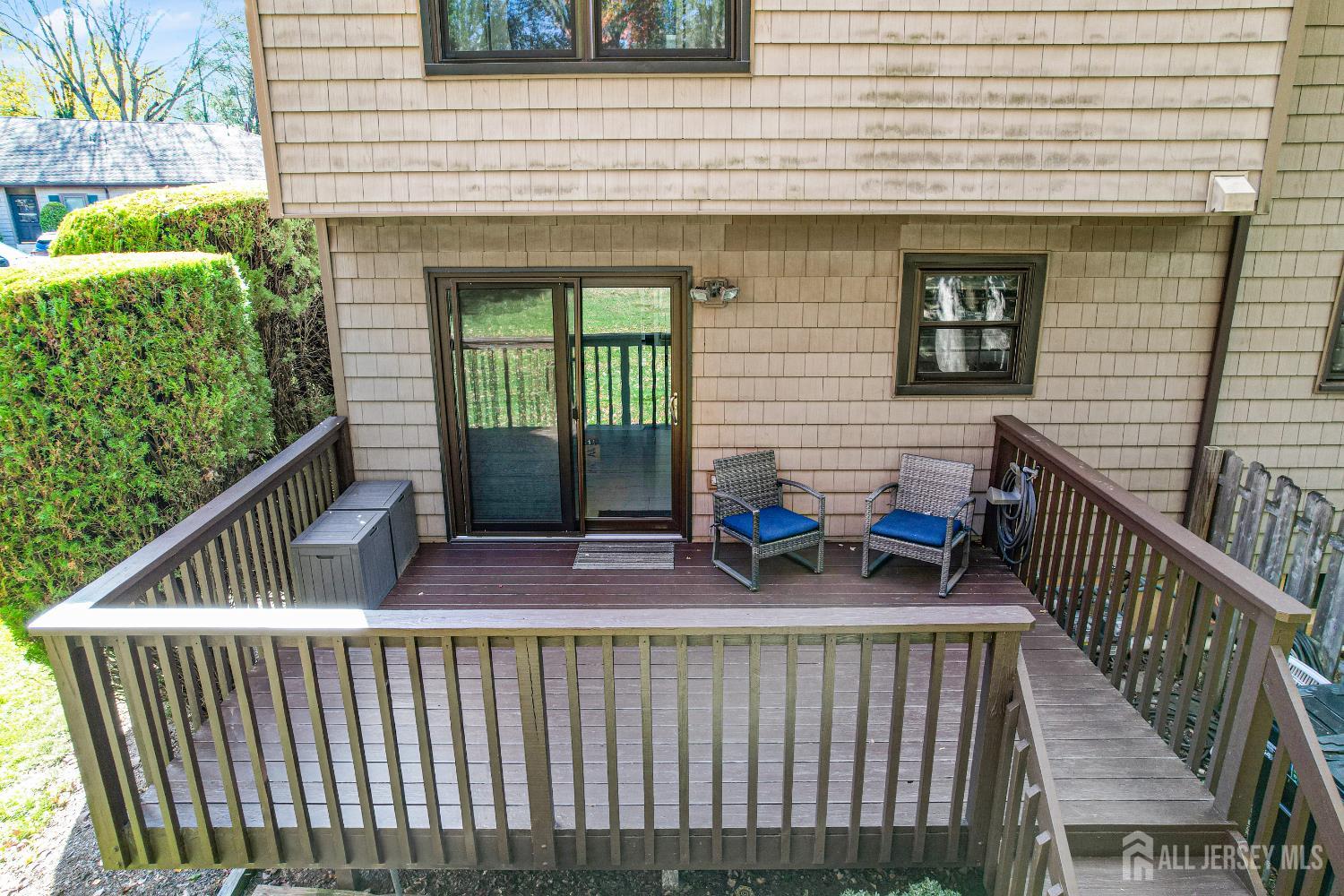 83 Pheasant Run Edison, NJ 08820 - Photo 35 of 38 a view of two chairs in the balcony