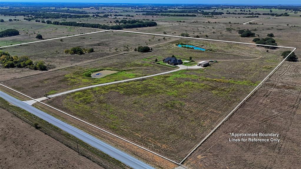 1150 Lone Star Road Bowie, TX 76230 - Photo 35 of 38 an aerial view of a tennis court