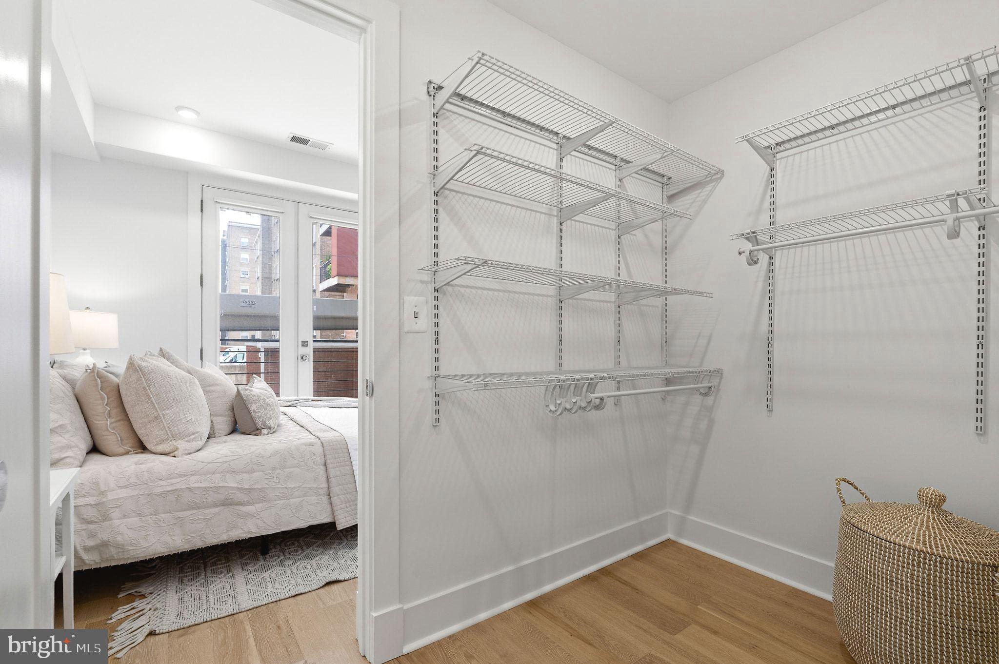 2717 Ontario Road Northwest, Unit 102 Washington, DC 20009 - Photo 17 of 32 Expansive walk-in closet, custom shelving