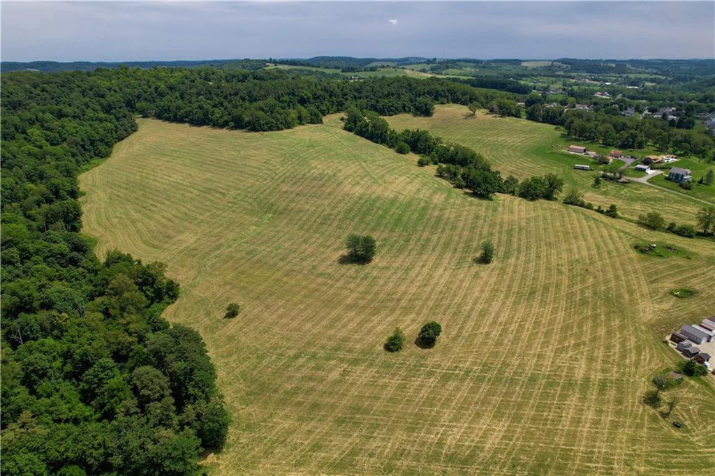 16 Petricca Drive Burgettstown, PA 15021 - Photo 3 of 13 a view of a pathway both side of a building